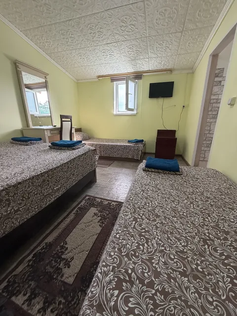 Номер с несколькими кроватями